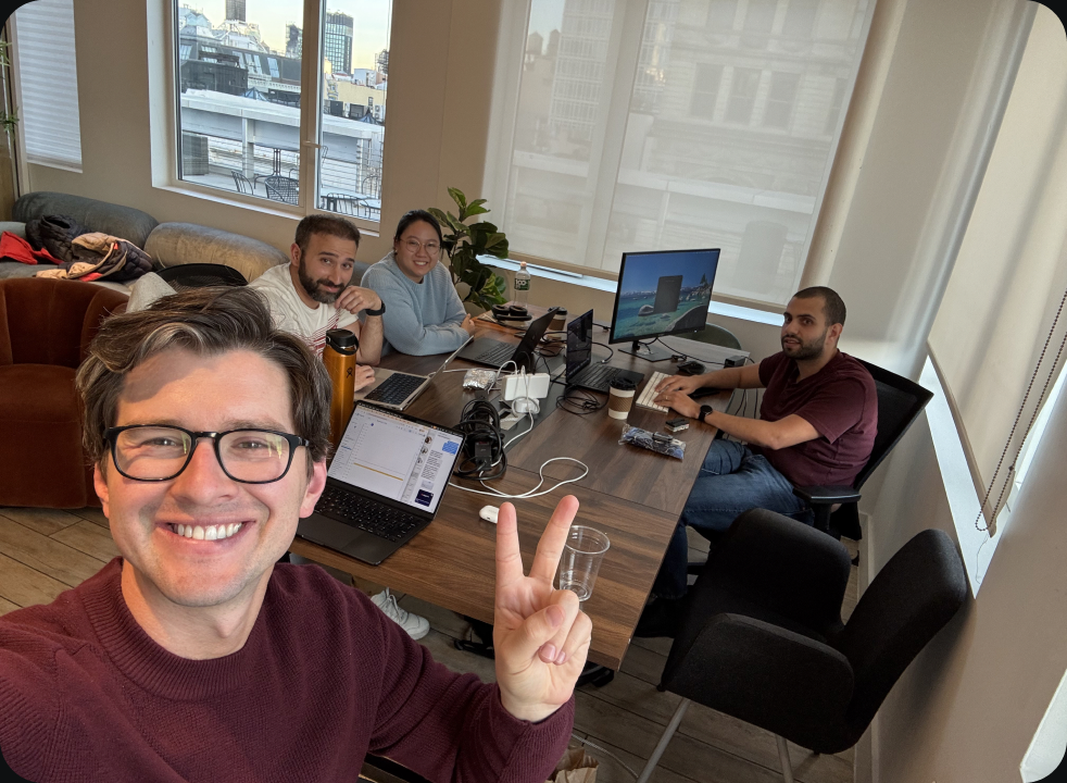 Closure team collaborating around a conference table
