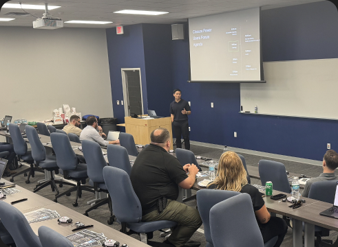 Closure presenting to law enforcement personnel in a training room